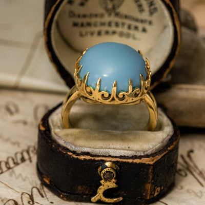 Unisex solid gold ring set with a turquoise cabochon. A stunning revival of the 19th century jewelry designs and heavily inspired by oriental influence.  This ring is skuilfully hand-crafted by our goldsmith from recycled gold and ethically sourced turquoise.