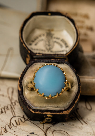 Unisex solid gold ring set with a turquoise cabochon. A stunning revival of the 19th century jewelry designs and heavily inspired by oriental influence.  This ring is skuilfully hand-crafted by our goldsmith from recycled gold and ethically sourced turquoise.