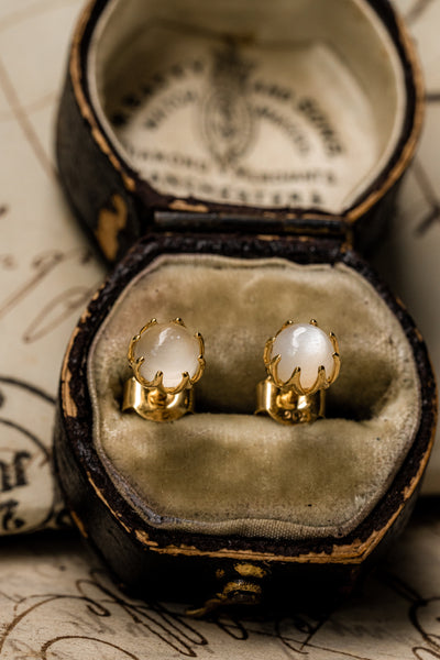 Shimmering and all-over lovely antique revival moonstone studs are designed by our goldsmiths. They are handmade of solid 10k yellow gold, these beautiful Ottoman style earrings are set with moonstone cabochons.