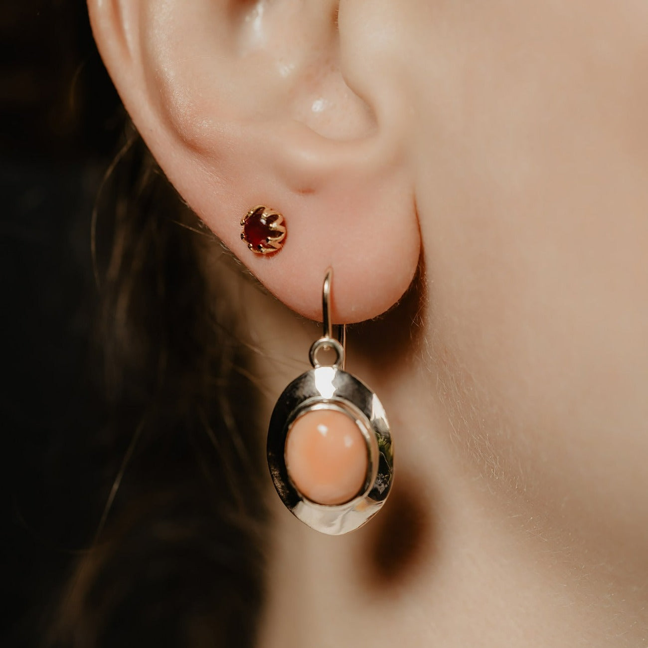 Mystic shimmer of deep-red garnet - these antique revival garnet cabochon studs are designed by our goldsmiths. Made of solid 10k yellow gold, these gold oriental style earrings are inspired by Ottoman architecture.