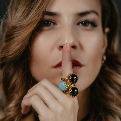 Unisex solid gold ring set with a garnet cabochon. A stunning revival of the 19th century jewelry designs and heavily inspired by oriental influence.  This ring is skuilfully hand-crafted by our goldsmith from recycled gold and ethically sourced garnet.