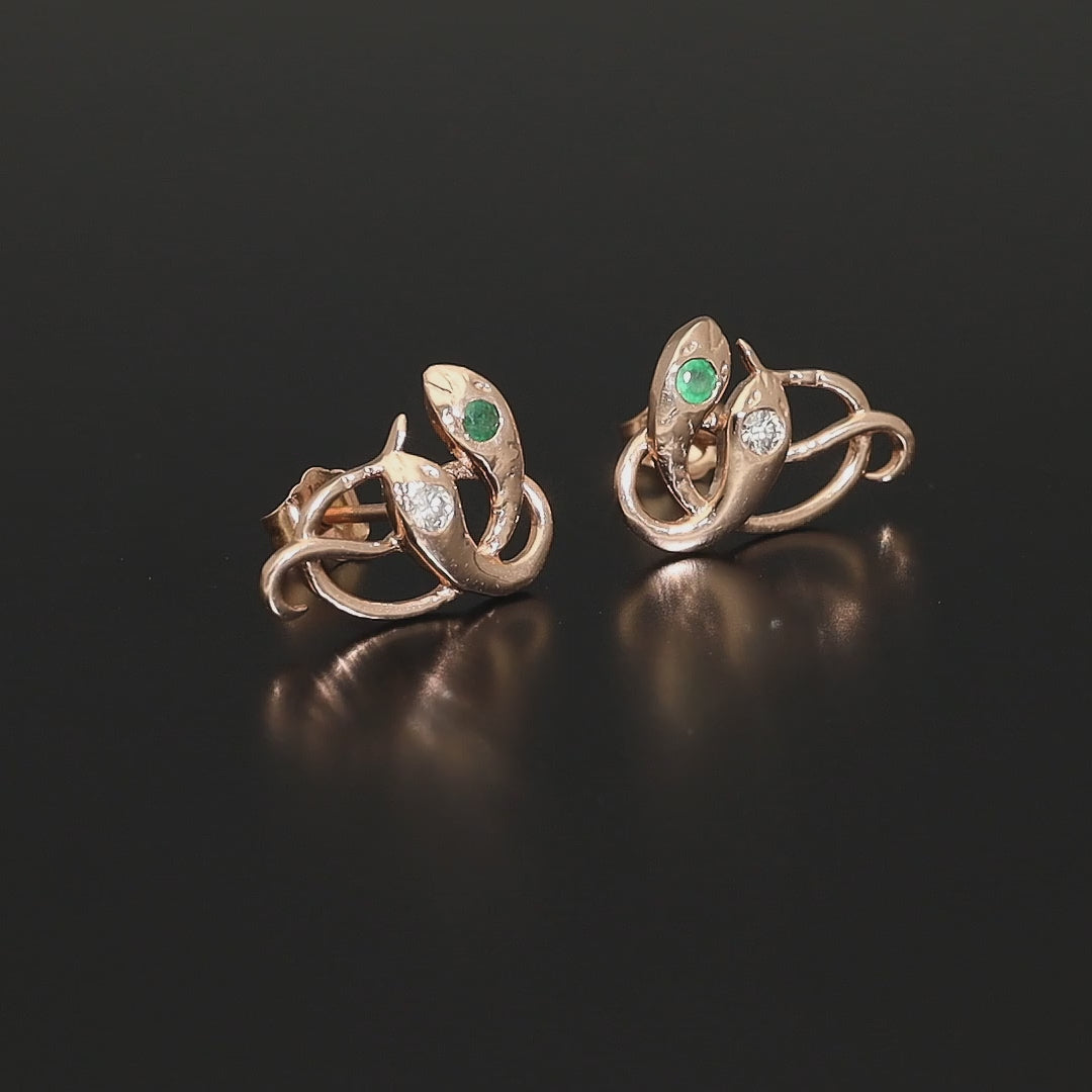 Inspired by the 19th century animal jewelry, these artisan solid gold snake studs are set with the natural precious stones.  Handmade with love and passion, these statement unisex earrings are made of solid 14 carat rose gold and are set with mined natural diamonds and emeralds.  A piece of history to mix-and-match with your ear candies!