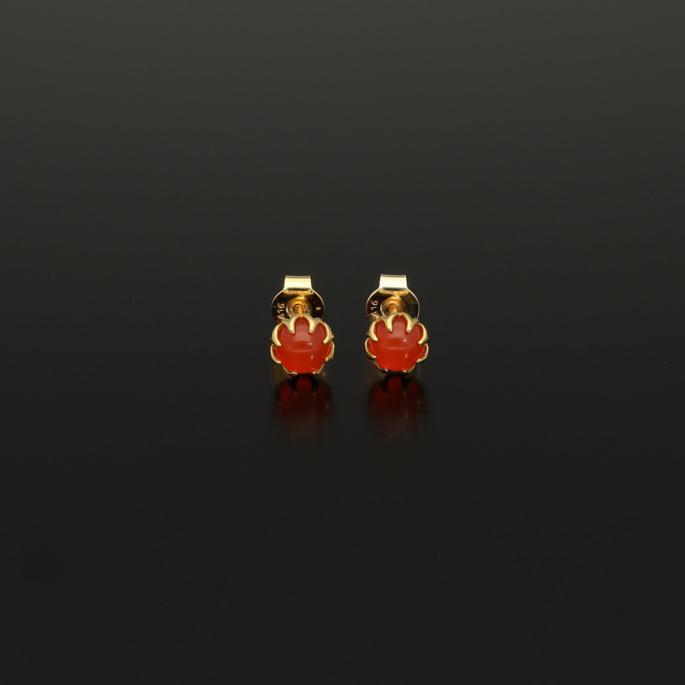 Perfect Autumn earrings! Shimmering with orange fire these antique revival carnelian studs are handmade and are designed by our goldsmiths.  Made of solid 10k yellow gold, these beautiful oriental style earrings are inspired by 19th century Ottoman architecture.