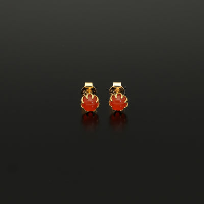 Perfect Autumn earrings! Shimmering with orange fire these antique revival carnelian studs are handmade and are designed by our goldsmiths.  Made of solid 10k yellow gold, these beautiful oriental style earrings are inspired by 19th century Ottoman architecture.