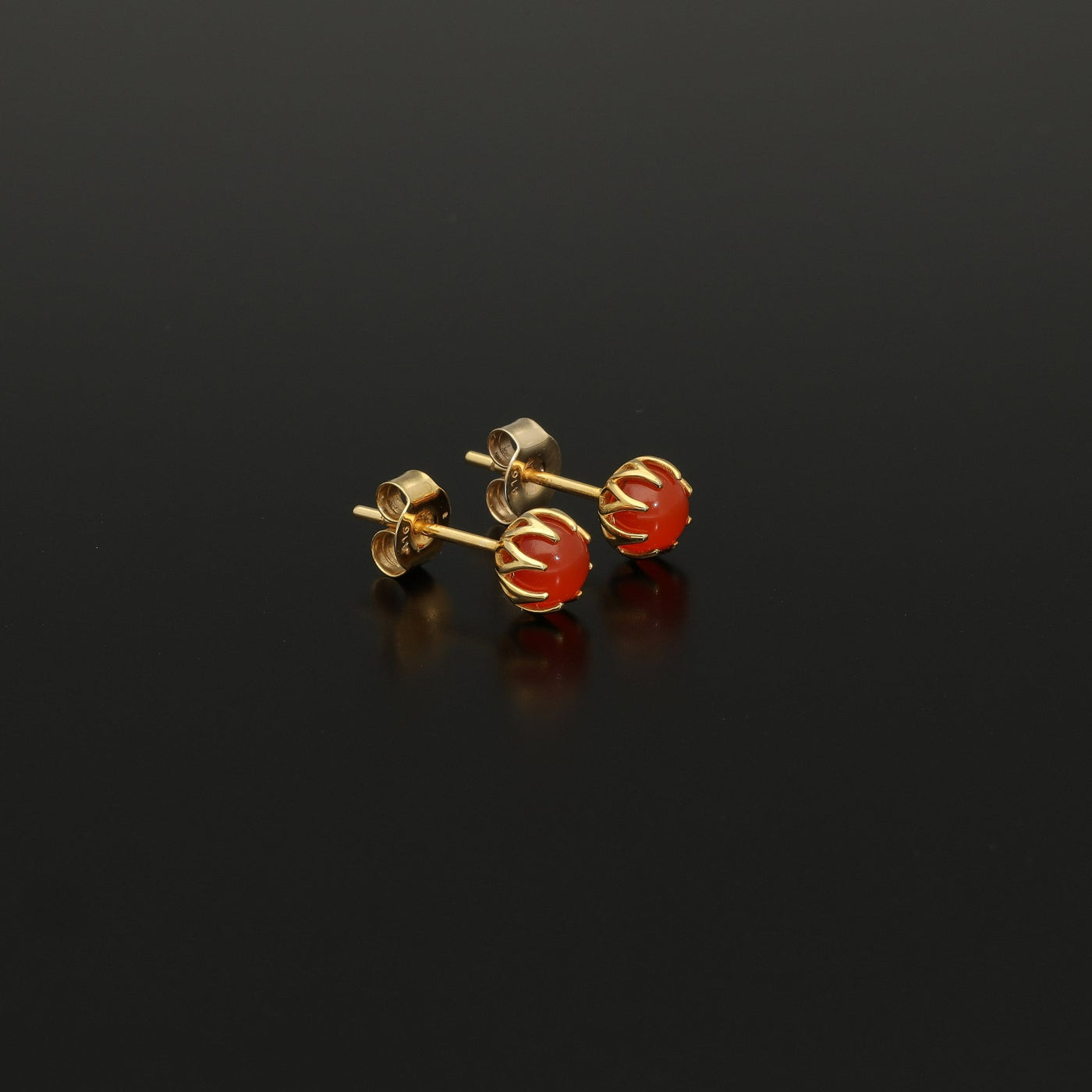 Perfect Autumn earrings! Shimmering with orange fire these antique revival carnelian studs are handmade and are designed by our goldsmiths.  Made of solid 10k yellow gold, these beautiful oriental style earrings are inspired by 19th century Ottoman architecture.