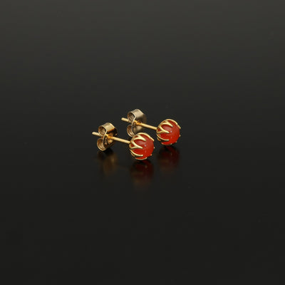 Perfect Autumn earrings! Shimmering with orange fire these antique revival carnelian studs are handmade and are designed by our goldsmiths.  Made of solid 10k yellow gold, these beautiful oriental style earrings are inspired by 19th century Ottoman architecture.