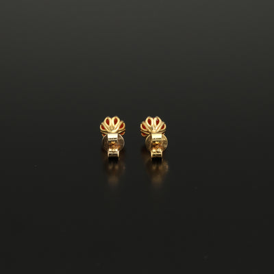 Perfect Autumn earrings! Shimmering with orange fire these antique revival carnelian studs are handmade and are designed by our goldsmiths.  Made of solid 10k yellow gold, these beautiful oriental style earrings are inspired by 19th century Ottoman architecture.