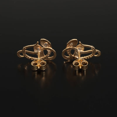 Inspired by the 19th century animal jewelry, these artisan solid gold snake studs are set with the natural mined diamonds.  Handmade with love and passion, these statement unisex earrings are made of solid 14 carat yellow gold and are set with 46 sparkling diamonds.  Here they come, your unorthodox diamond studs!