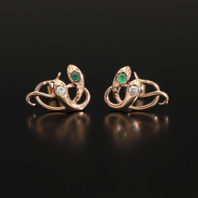 Inspired by the 19th century animal jewelry, these artisan solid gold snake studs are set with the natural precious stones.  Handmade with love and passion, these statement unisex earrings are made of solid 14 carat rose gold and are set with mined natural diamonds and emeralds.  A piece of history to mix-and-match with your ear candies!