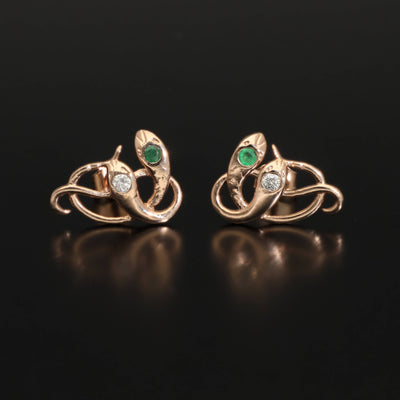 Inspired by the 19th century animal jewelry, these artisan solid gold snake studs are set with the natural precious stones.  Handmade with love and passion, these statement unisex earrings are made of solid 14 carat rose gold and are set with mined natural diamonds and emeralds.  A piece of history to mix-and-match with your ear candies!