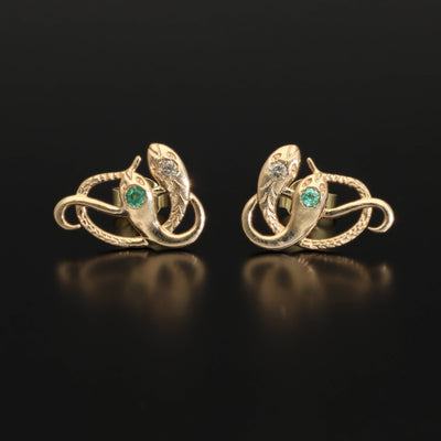 Inspired by the 19th century animal jewelry, these artisan solid gold snake studs are set with the natural precious stones.  Handmade with care, these statement unisex earrings are made of solid 14 carat yellow gold and are set with mined natural diamonds and emeralds.  A piece of history to mix-and-match with your ear candies!