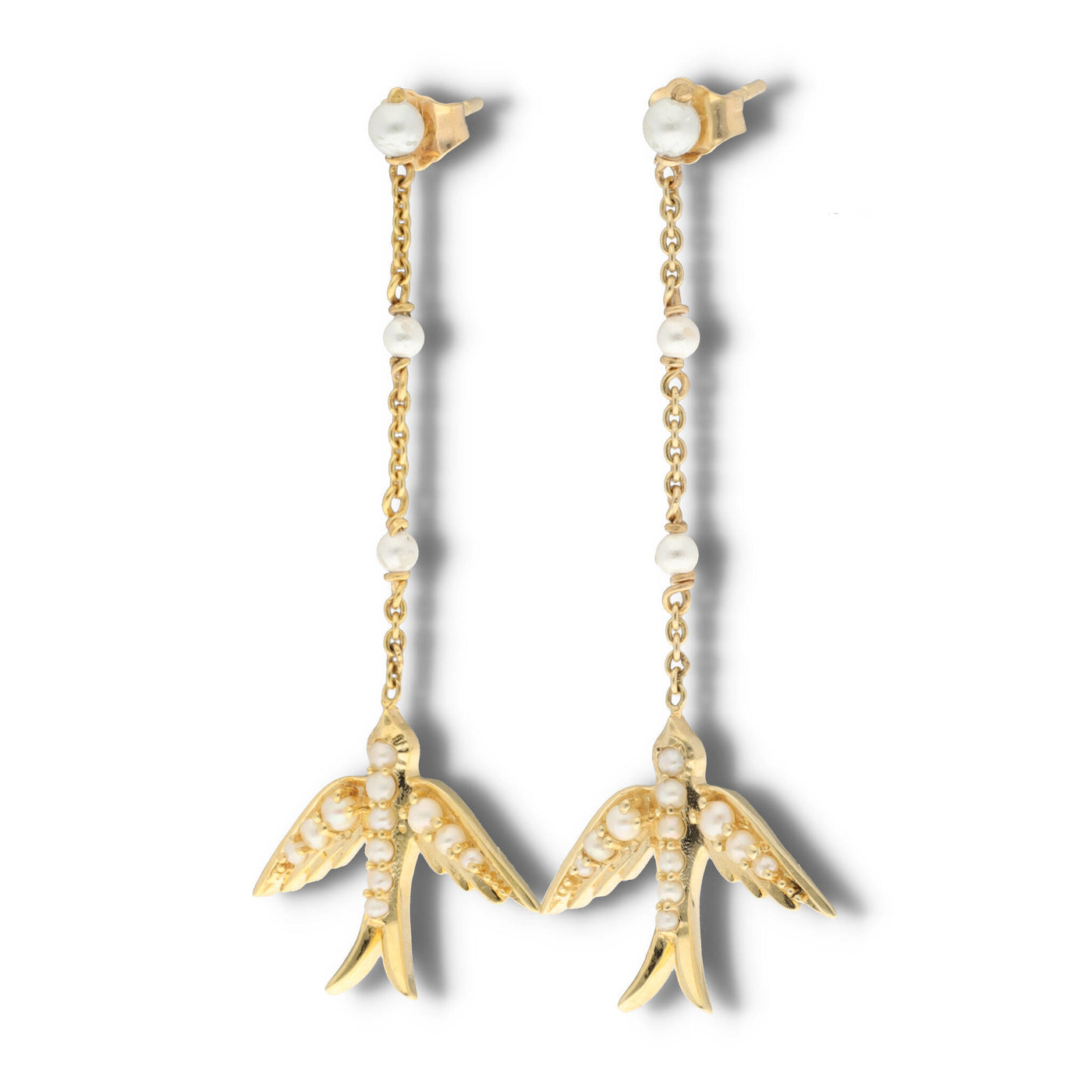 A perfect love token piece of jewelry! Romantic and very symbolic these antique revival drop earrings are handmade by our goldsmiths. Made of solid 10k yellow gold, these beautiful Victorian style swallow earrings are set with natural pearls.