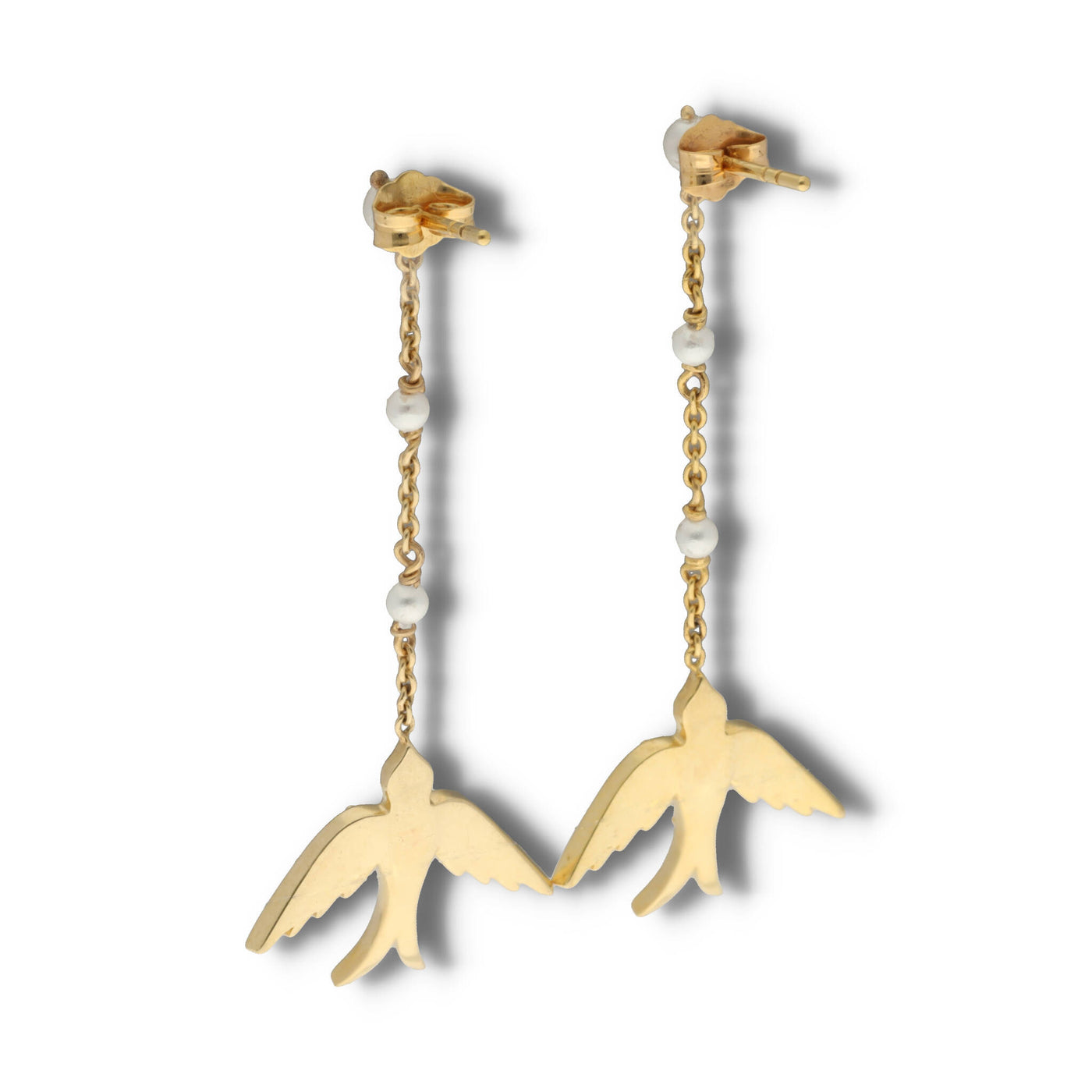 A perfect love token piece of jewelry! Romantic and very symbolic these antique revival drop earrings are handmade by our goldsmiths. Made of solid 10k yellow gold, these beautiful Victorian style swallow earrings are set with natural pearls.