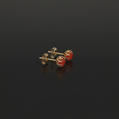 Perfect Autumn earrings! Shimmering with orange fire these antique revival carnelian studs are handmade and are designed by our goldsmiths.  Made of solid 10k yellow gold, these beautiful oriental style earrings are inspired by 19th century Ottoman architecture.